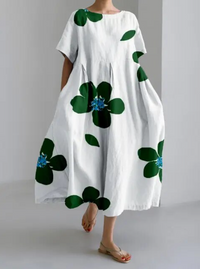 Amalia Blumenkleid | Stilvolles Kleid mit übergroßem Blumenmuster – Weiß-Dunkelgrün