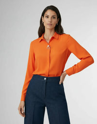 Elegante Langarm Bluse für Damen mit verdeckter Knopfleiste und dekorativer Schmuckspange – Orange