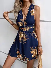 Mila | Jumpsuit mit tiefem V-Ausschnitt und Blumenmuster zum Binden für Frauen – Tiefblau