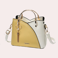 Elegante Damenhandtasche aus stilvollem veganem Leder – Gelb