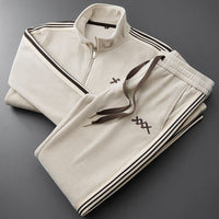 Herren-Trainingsanzug aus Cord mit Reißverschlussjacke und Hose mit Seitenstreifen – Beige