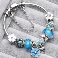 Sommerliche Pfirsichblüten Silberner Charm-Armband | Zeitloses und Elegantes Accessoire für Jeden Anlass – Blau