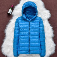 TEODORA - GESTEPPTE JACKE MIT KAPUZE – Blau