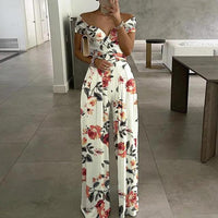 Damen Jumpsuit mit Off-Shoulder-Ausschnitt und Wickeloberteil mit weitem Bein – Weiß mit Blumendruck