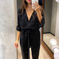Damen Langärmliger Pailletten-Jumpsuit mit tiefem V-Ausschnitt und Bindegürtel – Schwarz