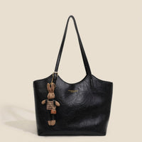 Mia | Damen Veganleder Tote Bag Schultertasche mit Plüsch-Anhänger – Schwarz