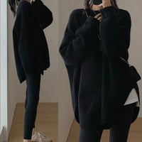 Clionya | Entspannter raffinierter Pullover mit Rundhalsausschnitt und Tropfenschulter – Schwarz