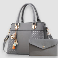 Lucy | Elegante Handtasche mit abnehmbarem Riemen – Grau