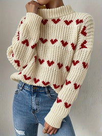 Dreianor | Kuschelige Herzen Pullover mit hohem Hals – Rotes Herz auf beigem Hintergrund