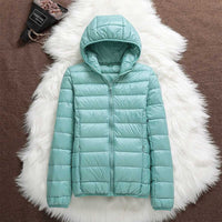 TEODORA - GESTEPPTE JACKE MIT KAPUZE – Türkis