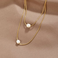 Schichtkette mit Süßwasserperlen – 18K Gold