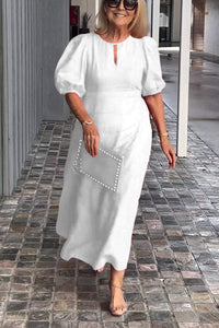 "Natalia | Zeitloses Eleganzkleid" could be rewritten as "Natalia | Klassisches Eleganzkleid". – Weiß