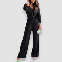 Stella | Langärmeliger Jumpsuit mit gebundenem V-Ausschnitt und weitem Bein – Schwarz